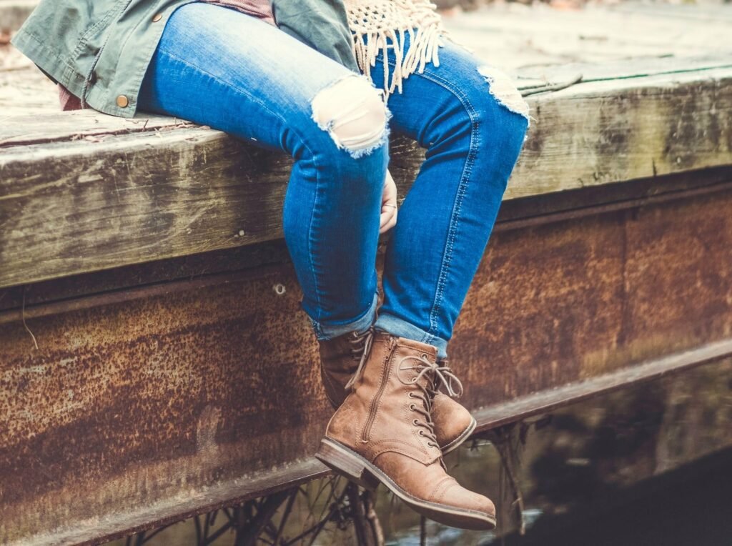person sitting on boat dock