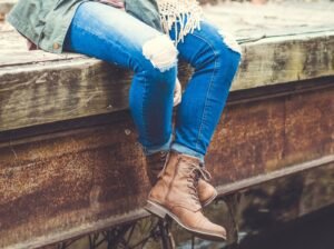 person sitting on boat dock